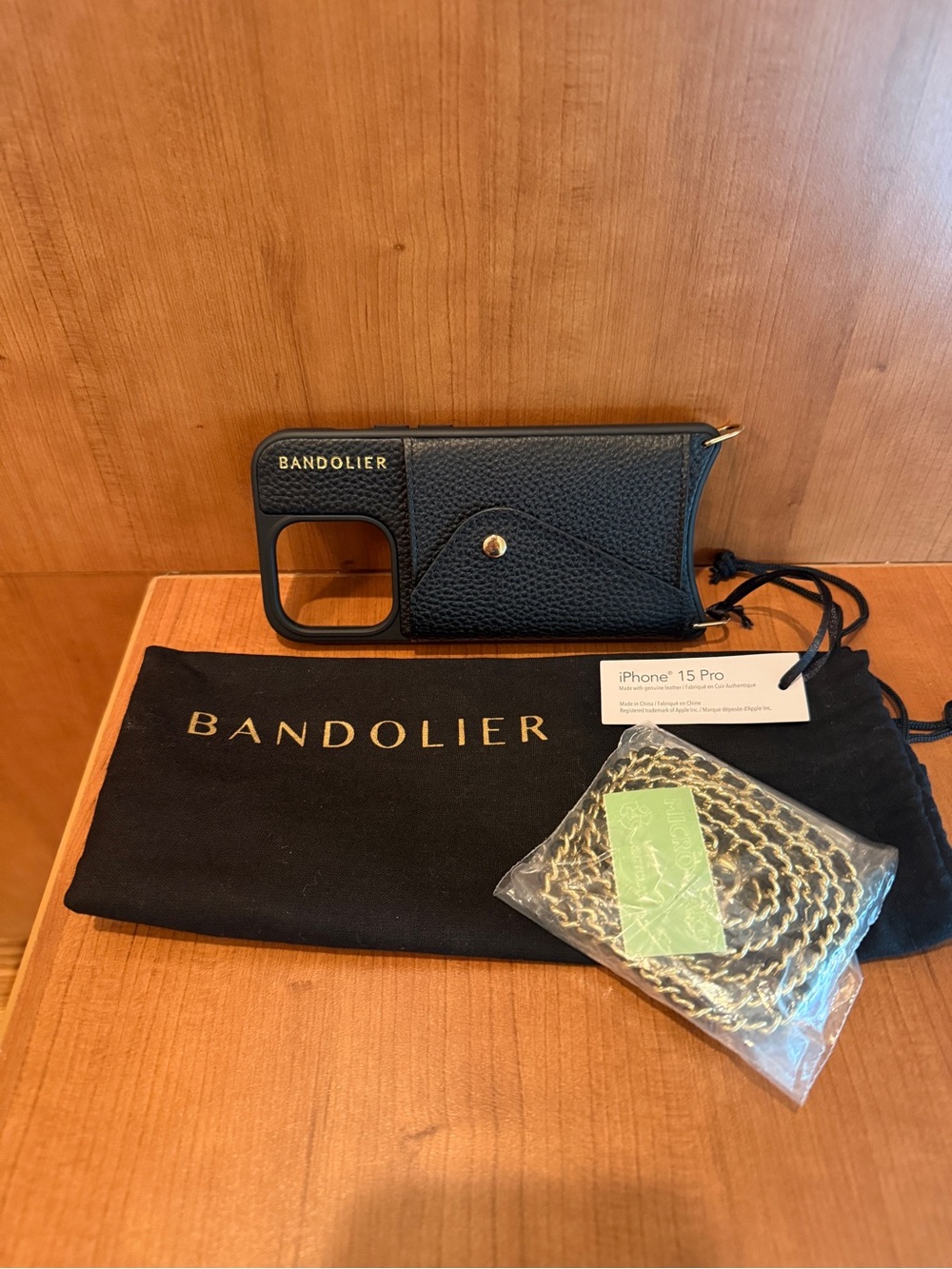 Bandolier Black Leather iPhone 15 Pro Crossbody Wallet Case with Gold Accents